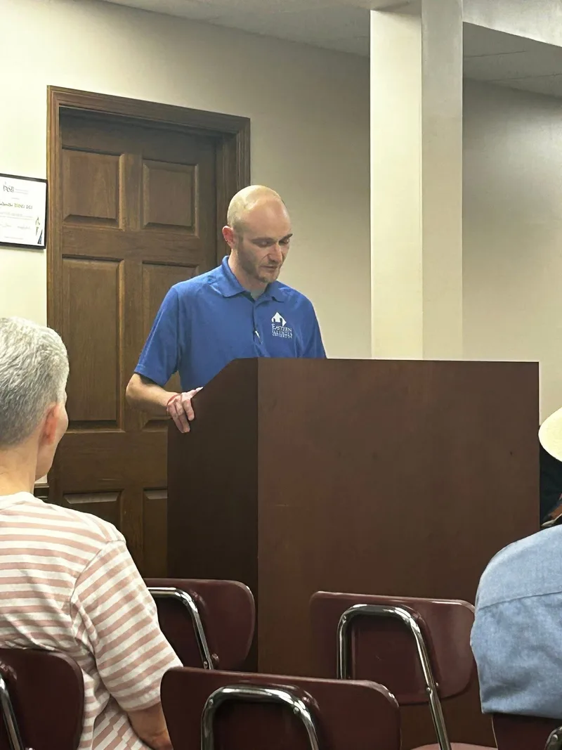 BFT Teachers' Council Vice President Thomas Gallaher shares good news with the school board and district administration.